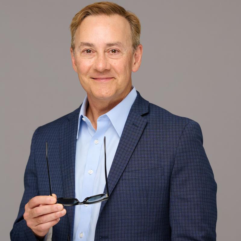 Dr Victor Aluise